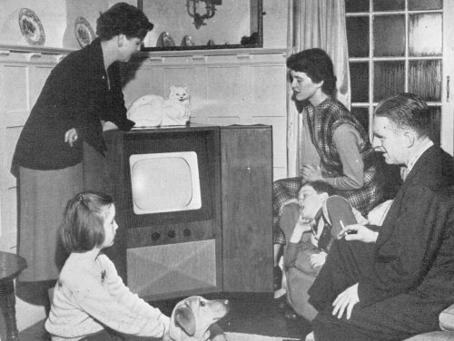 Norman Collins and family gather round their television in 1953